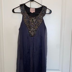 Statement dress with beaded neckline